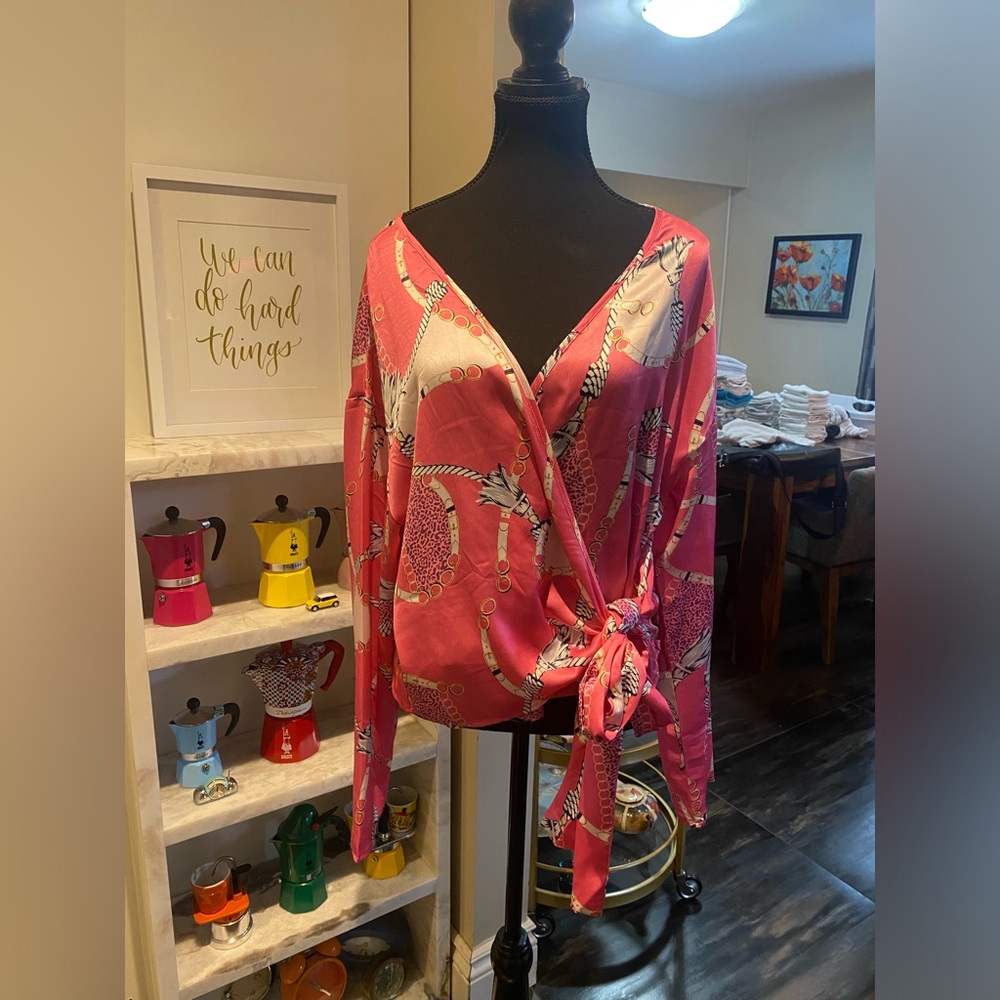 Stunning Wrap around pink top.